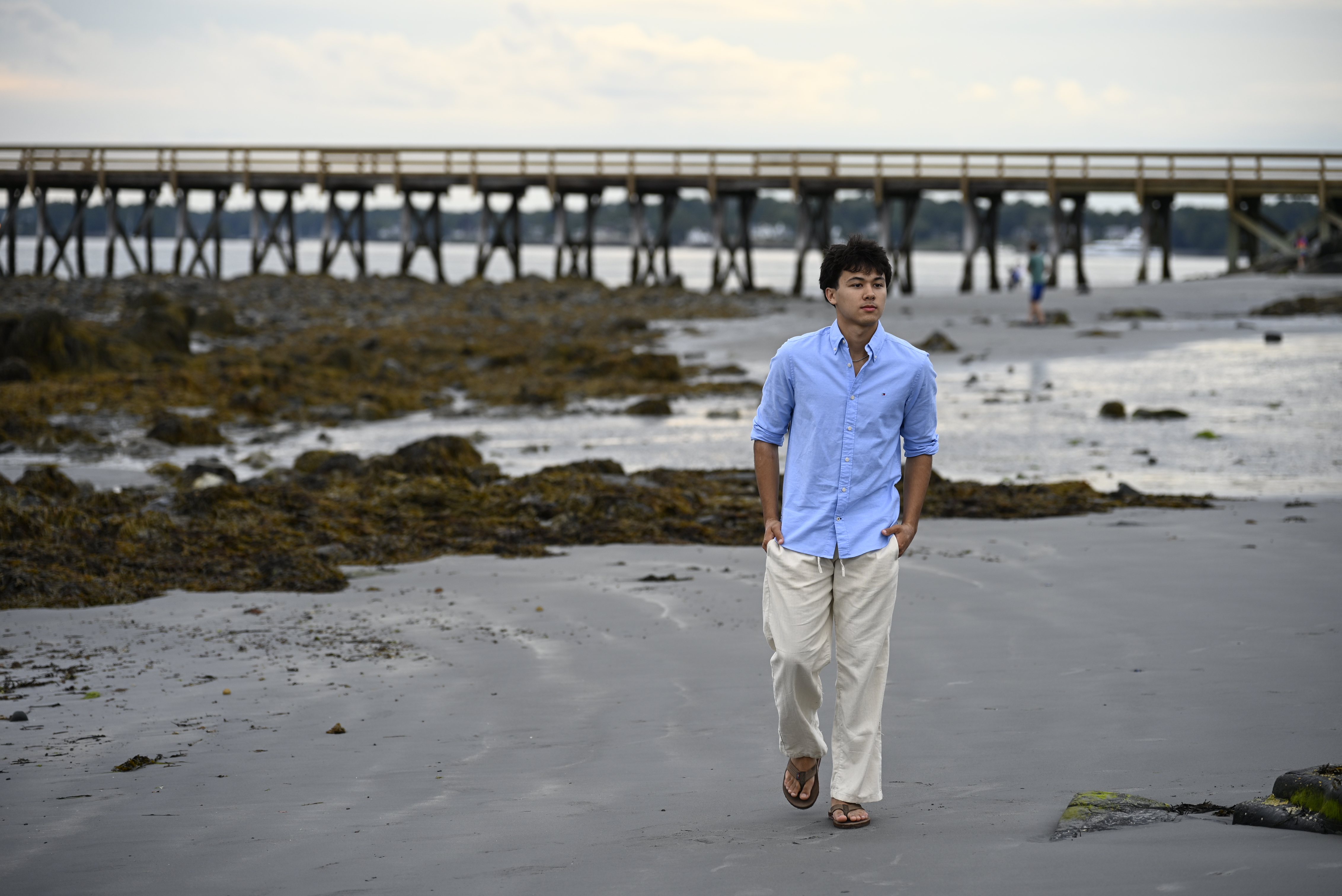 Senior portrait on the rocky shoreline at Fort Foster, Kittery, Maine